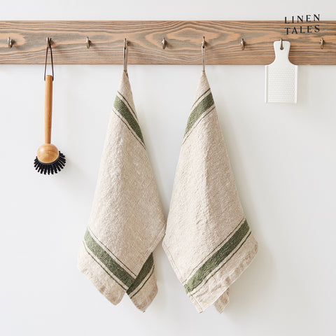 Linen tea towel, 40 x 65 cm, combining the drying and durability qualities of Lithuanian linen with stonewashed softness and appealing print and colour. Shown in Vintage Green Stripe on Natural. Handmade from 100% linen (310g) in Lithuania by Linen Tales.