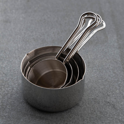 Quality stainless steel measuring cups in four sizes: 1/4 cup 60 ml; 1/3 cup 80 ml; 1/2 cup 125 ml; and 1 cup 250 ml. Small pouring spout on two sides and comfortable handle.