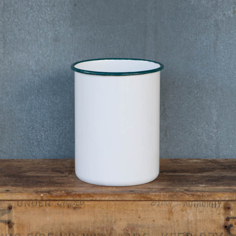 A sturdy utensil holder made from Romanian enamelware, in white with a blue rim. Base diameter 14cm and height 19cm, making it ideal for storing kitchen essentials like tongs and wooden spoons and spatulas, without tipping over.