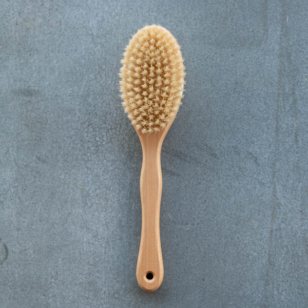 Body Brush made from natural bristles and beechwood timber. Use the body brush to massage and gently exfoliate skin, stimulating blood circulation and promoting a healthy glow.