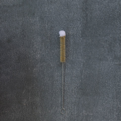 Use Redecker's 'Champagne' bottle brush, with its soft wool tip, to reach to the bottom of long stem glassware. The brush's narrowness makes it useful for cleaning tea/coffee pot spouts, vases and bottles.