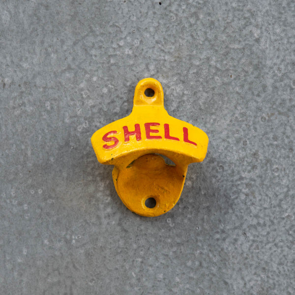 Bottle Opener, cast iron, handpainted, with Shell raised print. Comes with screws for mounting in a handy spot.