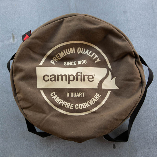 Camp Oven Canvas Bag with padded walls to protect cast iron cookware. Heavy duty cotton canvas bag has reinforced webbing carry straps, built in solid base, and strong reliable zipper.