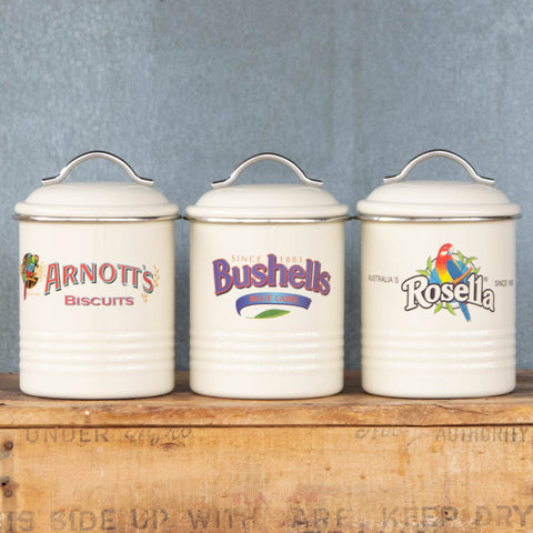 Enjoy three iconic Australian advertising logos printed on neutral cream coloured canisters. The three boxed canisters, feature vintage advertising brands Arnott's, Rosella, and Bushells.
