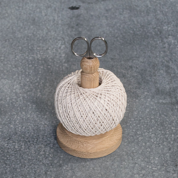 Cooking twine, oak spool and scissors by Creamore Mill, England. The handiest timber spool, with its own scissors, and cooking or general purpose twine.
