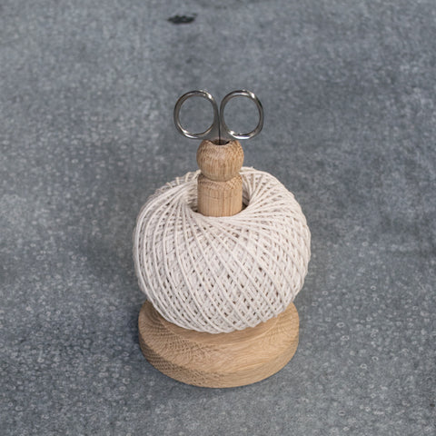 Cooking twine, oak spool and scissors by Creamore Mill, England. The handiest timber spool, with its own scissors, and cooking or general purpose twine.