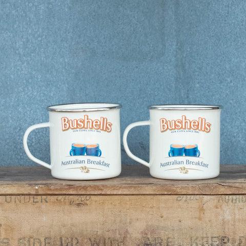 Enjoy the nostalgia and iconic vintage advertising brands of our enamel mugs, featuring the Bushell's logo, against a cream background.