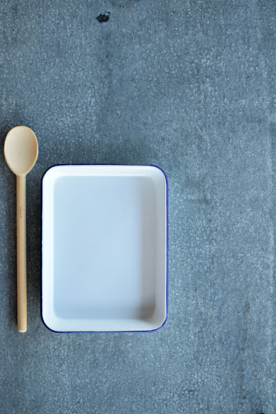 Falcon enamel baking tray, white with blue rim.