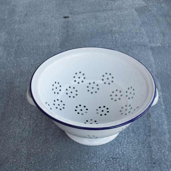 A perfect sized colander by Falcon enamelware for washing vegetables or draining pasta or rice. 