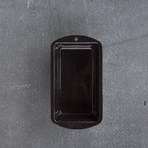 A Falcon enamel cake pan, rectangular in shape, ideal for loaf-style cakes (carrot cake, zucchini bread, banana bread).