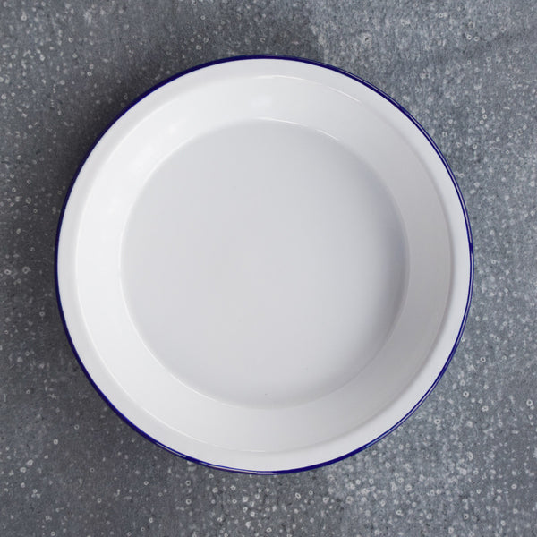 The Falcon enamelware pie plate makes a classic family sweet or savoury pie, 25cm diameter and 4cm deep. Available in white with a blue trim. Enamel pie plates are also great as an alternative to flat dinner plates for barbeques, picnics or camping because food doesn't slip away so easily.