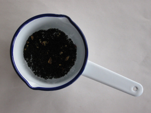 A Falcon enamel saucepan in ice white and cobalt blue. With lips on two sides the Falcon enamel saucepan is just what you need to brew chai, warm milk or heat a sauce on the stove.