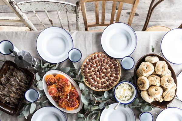The Falcon enamel flat dinner plate, in iconic white with a blue rim, has made the transition from the shearing shed and the campfire to the kitchen and dining room. Of course enamel plates are still very good camping plates too. Available in 26cm diameter and 24cm diameter (good dessert or entree plate size).