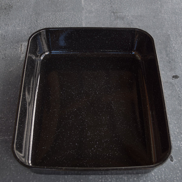 Reach for this deep Falcon enamel oblong roasting pan when cooking for a crowd. Dimensions: external rim to rim, 41 x 33cm, depth 8cm. Black graniteware, black with white speckles.