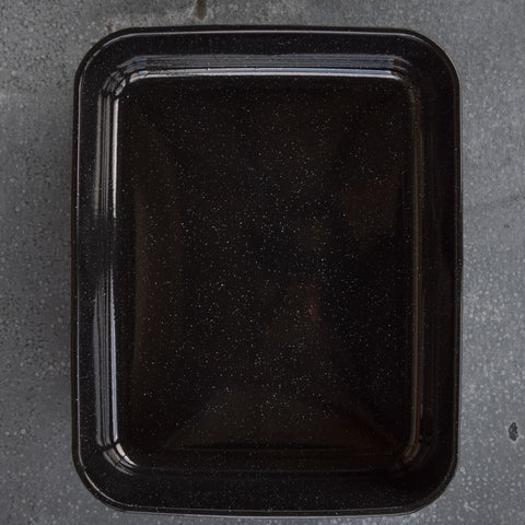 Reach for this deep Falcon enamel oblong roasting pan when cooking for a crowd. Dimensions: external rim to rim, 41 x 33cm, depth 8cm. Black graniteware, black with white speckles.