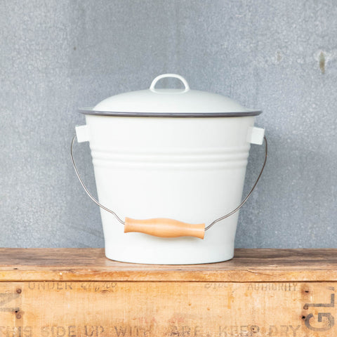 Falcon enamel five litre bucket with wooden grip handle. Perfect for collecting vegetable and fruit scraps for chickens, worm farms, or compost.