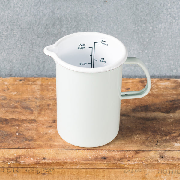 A must-have Falcon enamel measuring jug, one litre/4 cups, in black, white, duck egg or grey exterior and white interior with black printed measures. Extremely useful for measuring and pouring liquids when cooking.
