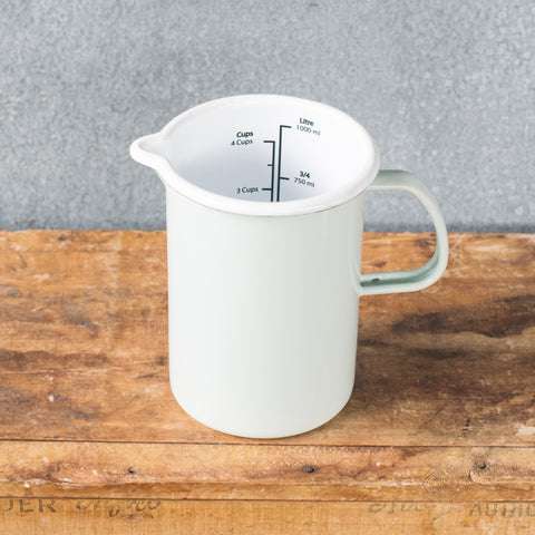 A must-have Falcon enamel measuring jug, one litre/4 cups, in black, white, duck egg or grey exterior and white interior with black printed measures. Extremely useful for measuring and pouring liquids when cooking.