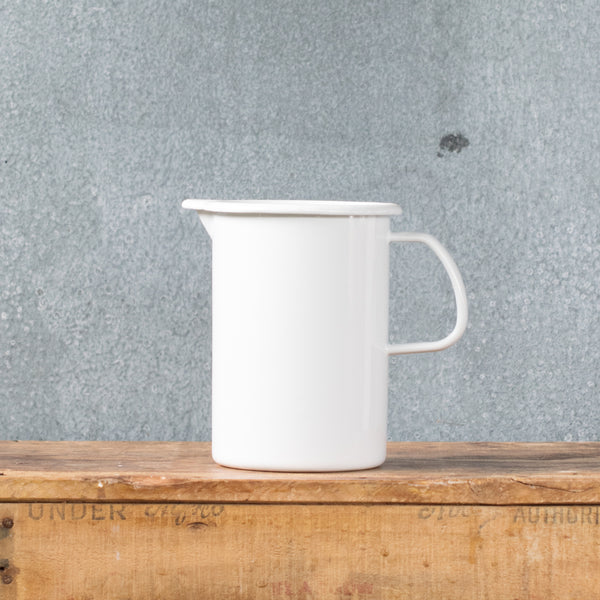 A must-have Falcon enamel measuring jug, one litre/4 cups, in black, white, duck egg or grey exterior and white interior with black printed measures. Extremely useful for measuring and pouring liquids when cooking.