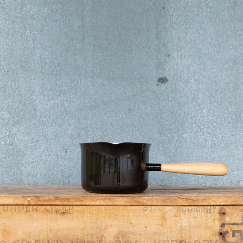 Falcon Enamel Miniature Saucepan, deluxe two-tone black and white with timber handle.
