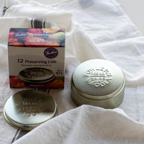 Fowlers Vacola Preserving Lids, size 4 1/4 to fit bottle sizes 28, 39, 42, 56. Available in standard (tinned) finish. Standard lids are tin-plated with a single lacquer coating, double coated on the inside to food grade. After processing leave preserving lids and clips on bottles for 12-18 hours to 