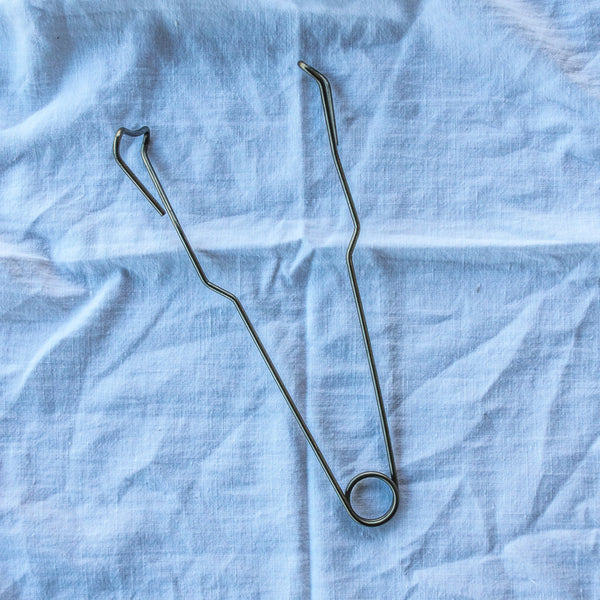 Use the Fowlers Vacola Preserving Bottle Tongs, specifically designed to remove hot bottles from your preserving unit after processing without dislodging lids from bottles.