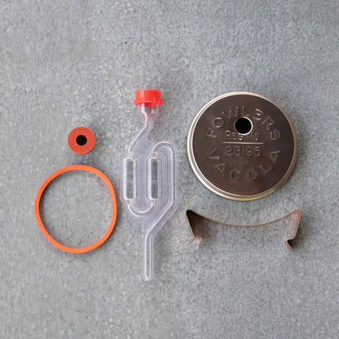 Fowlers Vacola Fermentation Lid Set to get started with fermenting. The set includes a Fowlers Vacola Lid to fit Fowlers Bottle No.31, No.36 or No.65, lid clip, two rubber seals and an air lock.