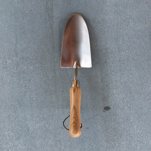 An essential Hand Trowel, polished stainless steel and certified FSC ash handle. Ideal for planting small plants, cuttings and seedlings, digging small holes, weeding, transplanting and mixing in fertiliser.