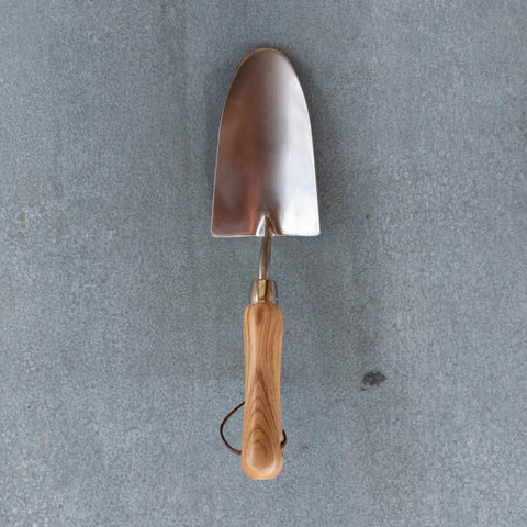An essential Hand Trowel, polished stainless steel and certified FSC ash handle. Ideal for planting small plants, cuttings and seedlings, digging small holes, weeding, transplanting and mixing in fertiliser.