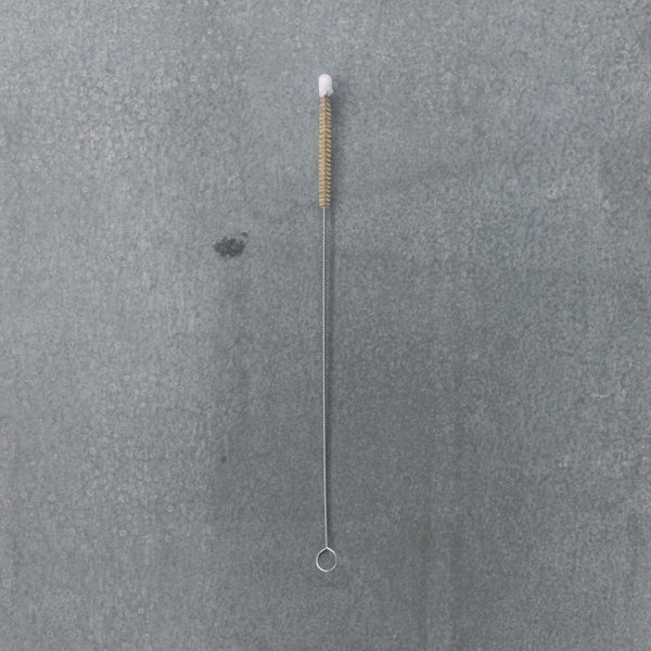 Slim bottle brush for cleaning small spaces like straws, drink bottles, narrow neck bottles and vases, and stems of glassware.