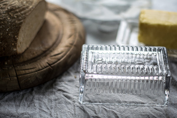 Butter really does taste better, and so much more attractive and easy to use served in a glass butter dish. Vintage styling gives this glass butter dish, with glass base and lid, retro appeal.