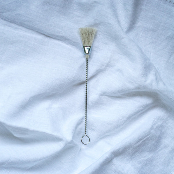 This wire and white horse hair pastry brush is a pleasure to use for brushing egg wash or milk onto pastry for a golden finish, basting foods, or cleaning ground coffee appliances. 