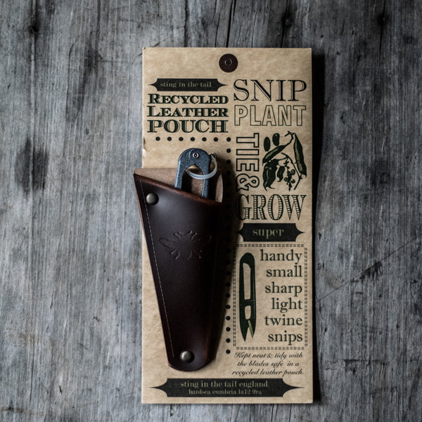 Keep metal gardening snips or small shears handy, stored in a recycled leather pouch threaded onto your belt or apron tie. Perfect for snipping herbs and vegetables for the night's dinner, light deadheading spent flowers or pruning.