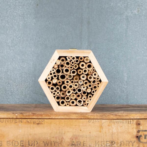A hexagon Insect Hotel, with bamboo to provide safe hollows to encourage solitary bees, butterflies, ladybirds and other beneficial insects in your garden.