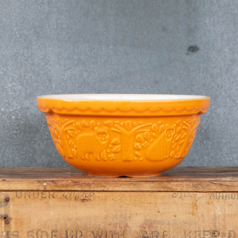 Mason Cash In the Forest earthenware mixing bowl, embossed woodland bear pattern, ochre coloured exterior, and cream interior. 