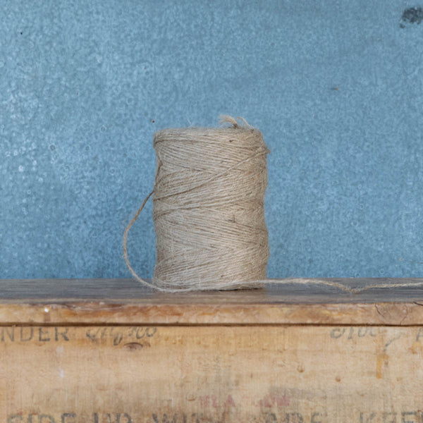 Jute Twine, 2 mm thick, tightly bound 3 ply, and 220 m spool. Light weight, but strong, suitable for multiple uses in the garden from marking out straight lines, and supporting plants, to training branches.