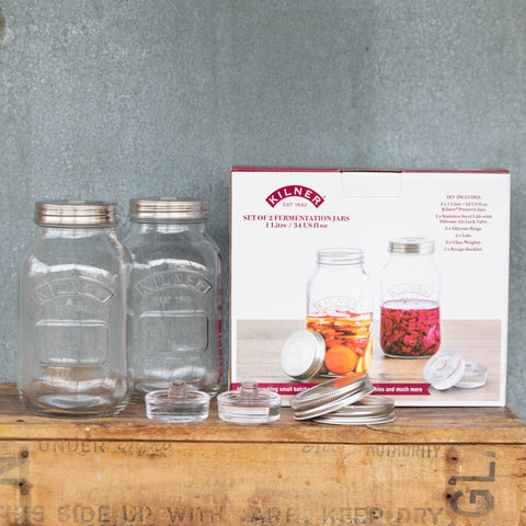 Kilner Fermentation Set to make small batches of sauerkraut, kimchi, pickles and more. The Kilner Fermentation Set includes 2 x 1 litre Kilner Preserving Jars, 2 x Silicone Steel Lids with Silicone Air Lock Valve, 2 x Silicone Rings, 2 x Lids, 2 x glass weights, and 1 x Recipe Booklet.