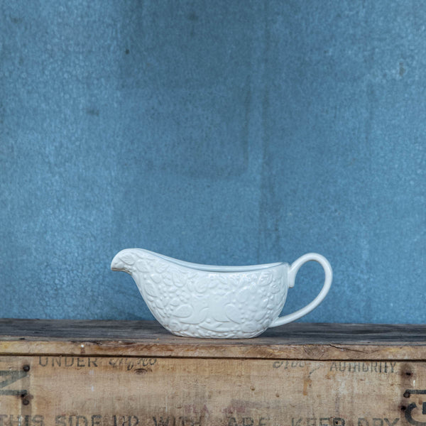 The Mason Cash In the Forest Gravy Boat is elegantly embossed with a pair of owls and foliage on each side. The motifs are inspired by forest scenes from folk tales of the mid 19th Century. Made from fine, durable stoneware which retains heat of sauces and gravy. 