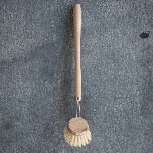 Dish brush, made from natural bristle and timber. With a long, easy-to-grip, timber handle and metal hanging loop, the head is removable so it can be replaced when the time comes.