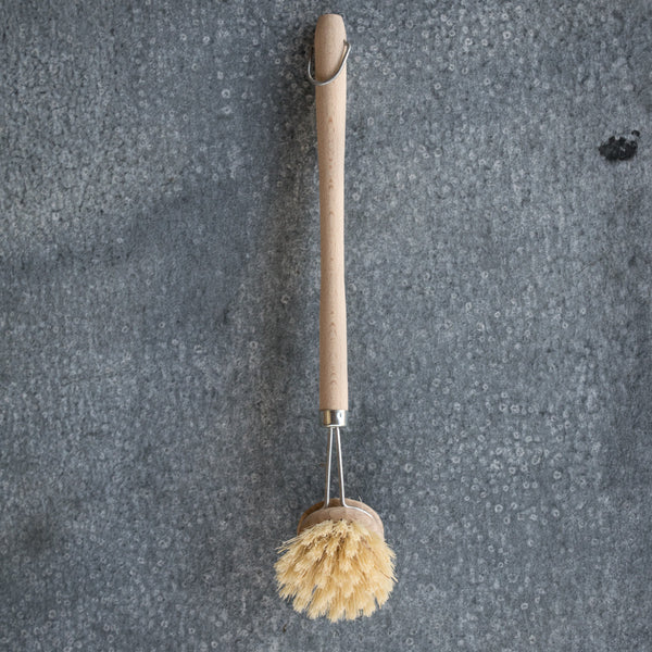 Dish brush, made from natural bristle and timber. With a long, easy-to-grip, timber handle and metal hanging loop, the head is removable so it can be replaced when the time comes.