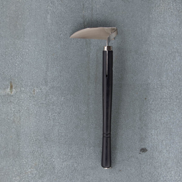 Nisaku Nejiri Bent Neck Sickle is a traditional Japanese garden tool with an extra sharp bottom edge to use as a draw hoe for weeding.