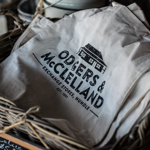Reusable calico bag, screenprinted both sides with our Odgers and McClelland Exchange Stores logo. You can't have enough reusable shopping bags. Leave them in the car to use when shopping for groceries, unpack, and return to the car so they are always on hand. 