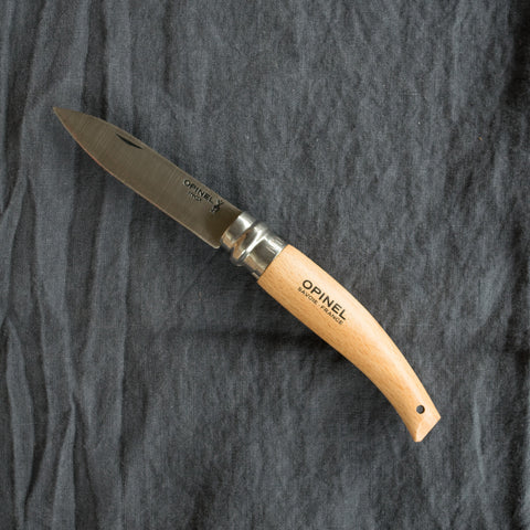 Opinel No. 8 stainless steel garden pocket knife, ideal for weeding, pruning, and cutting salad vegetables. 