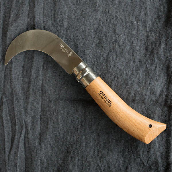An Opinel stainless steel pruning knife, in size no. 8 or no. 10. No. 8 is ideal for cutting ties, pruning, or grafting trees, while the larger no. 10 is better suited to grape picking, shrub pruning and incising fruit trees. 