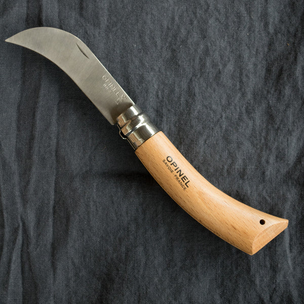 An Opinel stainless steel pruning knife, in size no. 8 or no. 10. No. 8 is ideal for cutting ties, pruning, or grafting trees, while the larger no. 10 is better suited to grape picking, shrub pruning and incising fruit trees. 