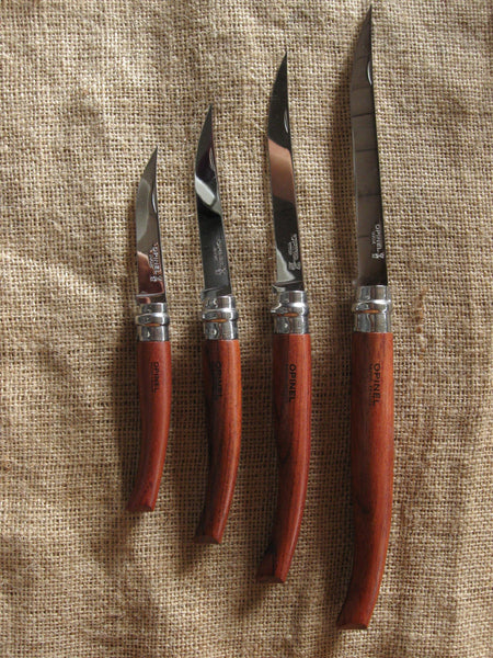 An Opinel fish filleting pocket knife with slimline polished stainless steel blade and Padauk handle. Available in four sizes 8cm, 10cm, 12cm, and 15cm. Made in France since 1890, Opinel knives are reliable, robust and easy to use.