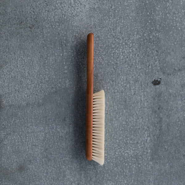 Duster made from goat hair and pearwood. Enjoy the artisan quality of the soft goat hair and slender, warm coloured, pearwood timber handle duster for reaching into narrow spaces.