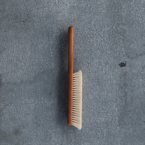 Duster made from goat hair and pearwood. Enjoy the artisan quality of the soft goat hair and slender, warm coloured, pearwood timber handle duster for reaching into narrow spaces.