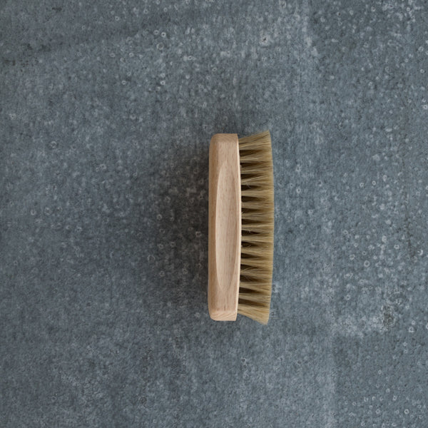Redecker shoe shine brush made from beautifully handcrafted beechwood and horse hair for effective cleaning and polishing. Available in neutral or black horse hair. 