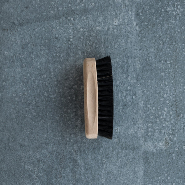 Redecker shoe shine brush made from beautifully handcrafted beechwood and horse hair for effective cleaning and polishing. Available in neutral or black horse hair. 